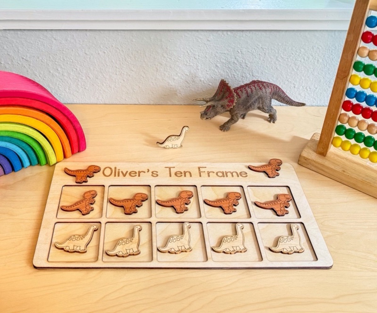 Dinosaur ten frame in use during a math activity