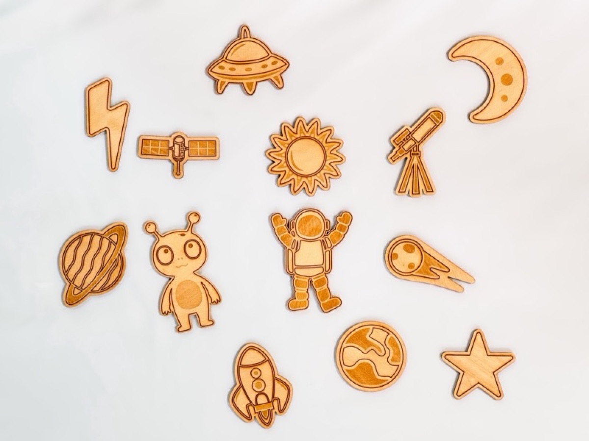 Space playscape pieces arranged for play