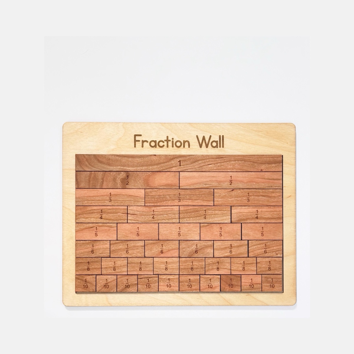 Baltic birch fraction wall engraved 'Fraction Wall' across the top, holding 39 cherry tiles in eight rows: one whole, then halves, thirds, fourths, fifths, sixths, eighths, and tenths, each engraved with its fraction